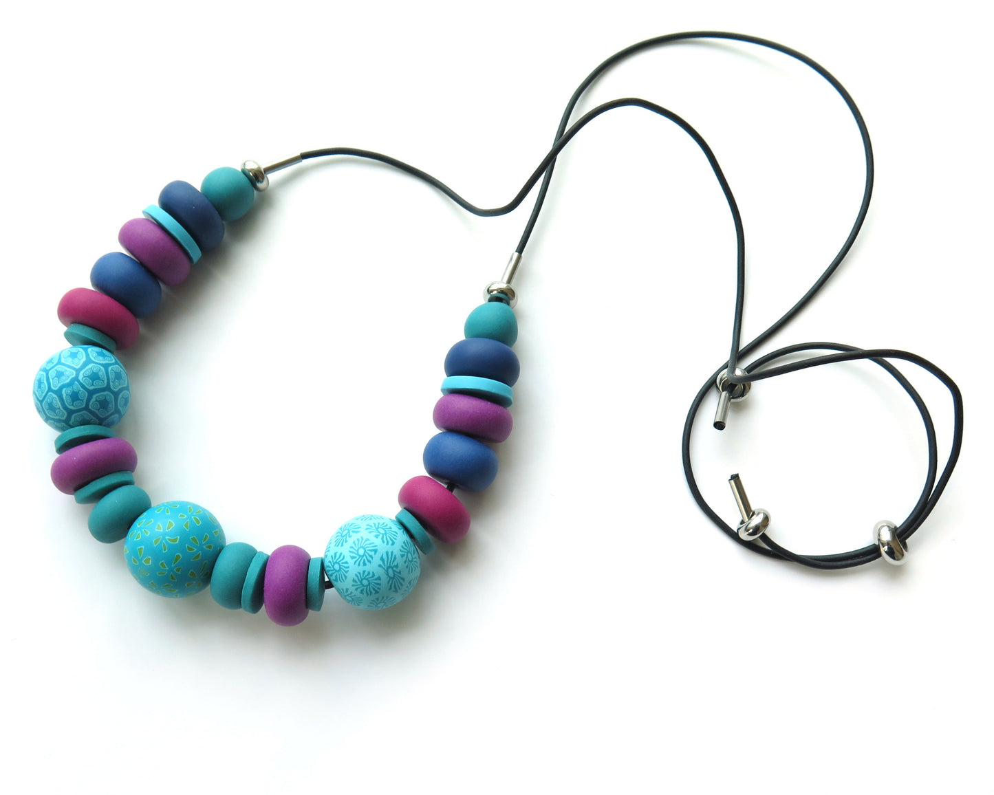 Necklace with chunky colourful beads on a white background