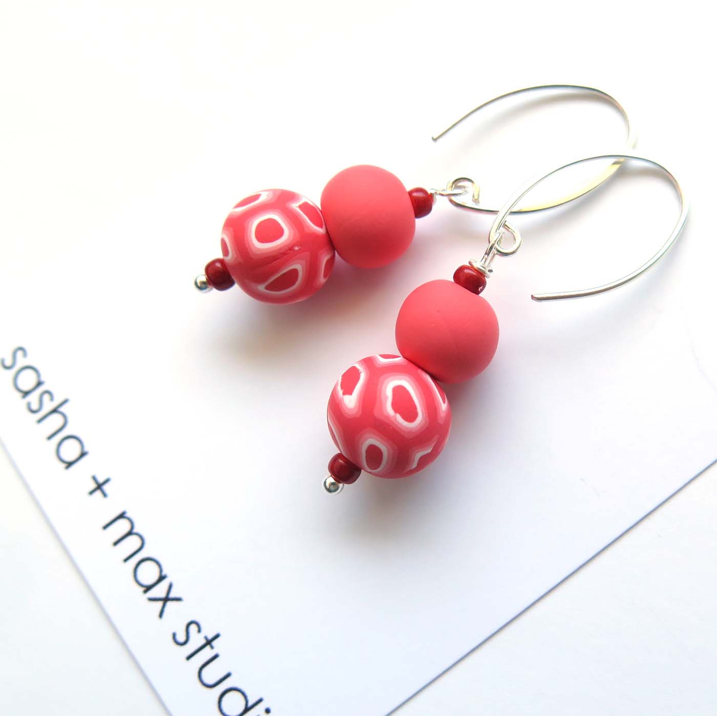 Swirl and coral beaded sterling silver hook drop earrings