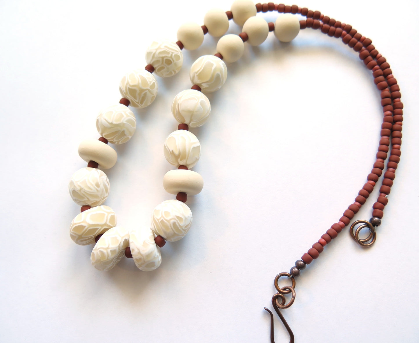 Swirl Ivory and white polymer clay beaded necklace