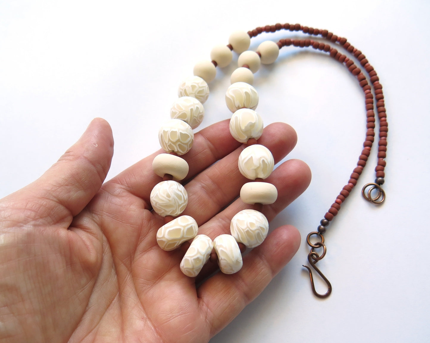Swirl Ivory and white polymer clay beaded necklace