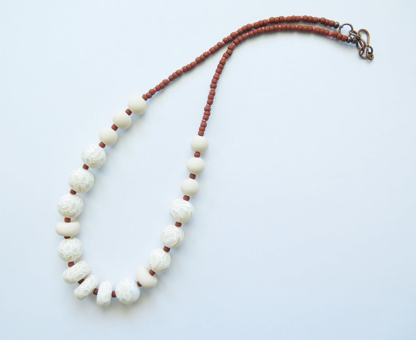 Swirl Ivory and white polymer clay beaded necklace