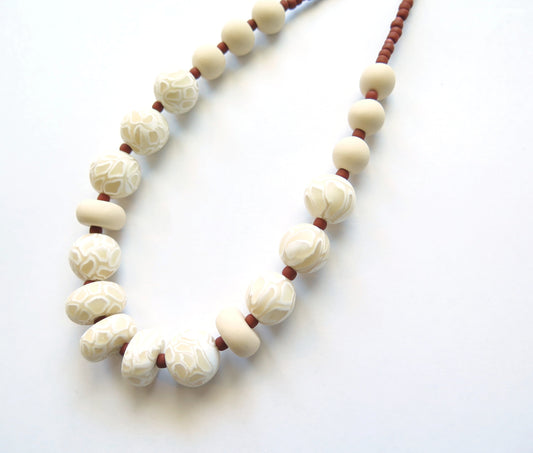 Swirl Ivory and white polymer clay beaded necklace