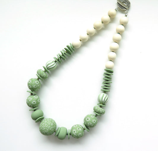 Green swirls polymer clay necklace