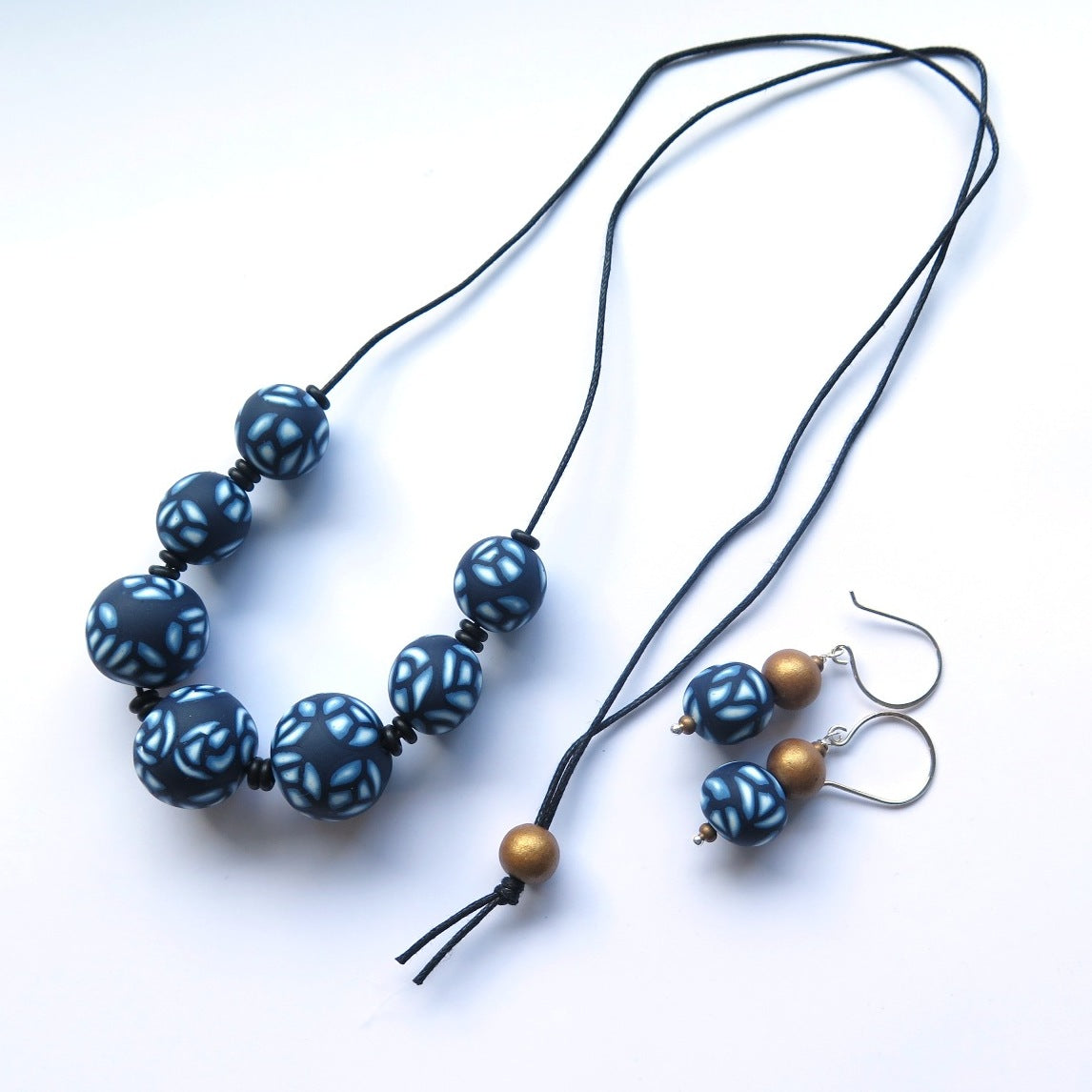 Navy Rose drop earrings